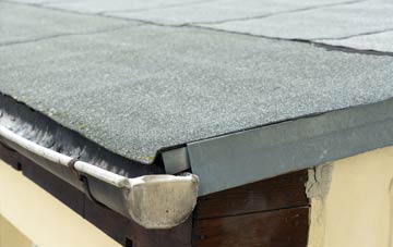 repair or replace Canton flat roofing?